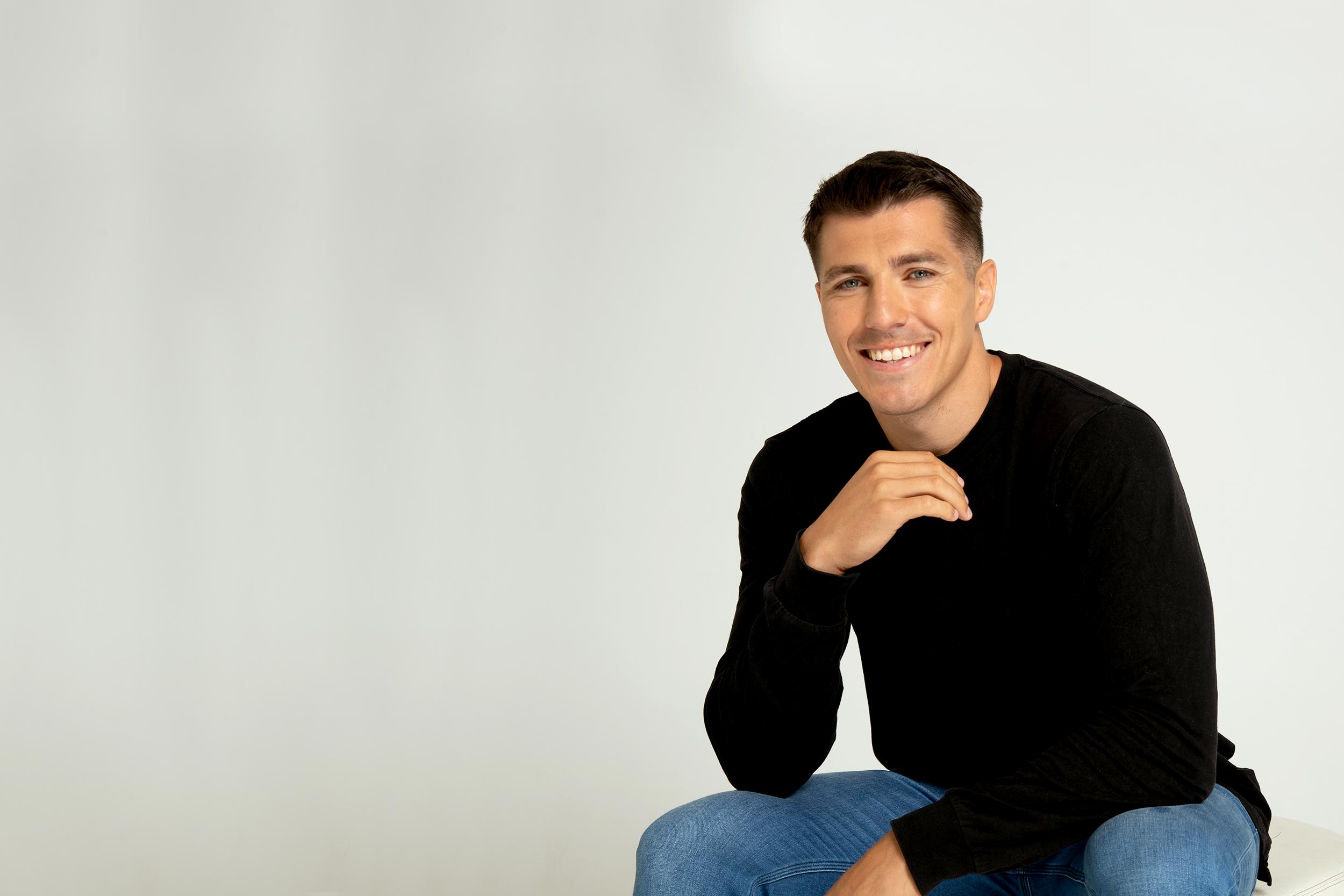 Man with straight teeth smiling.