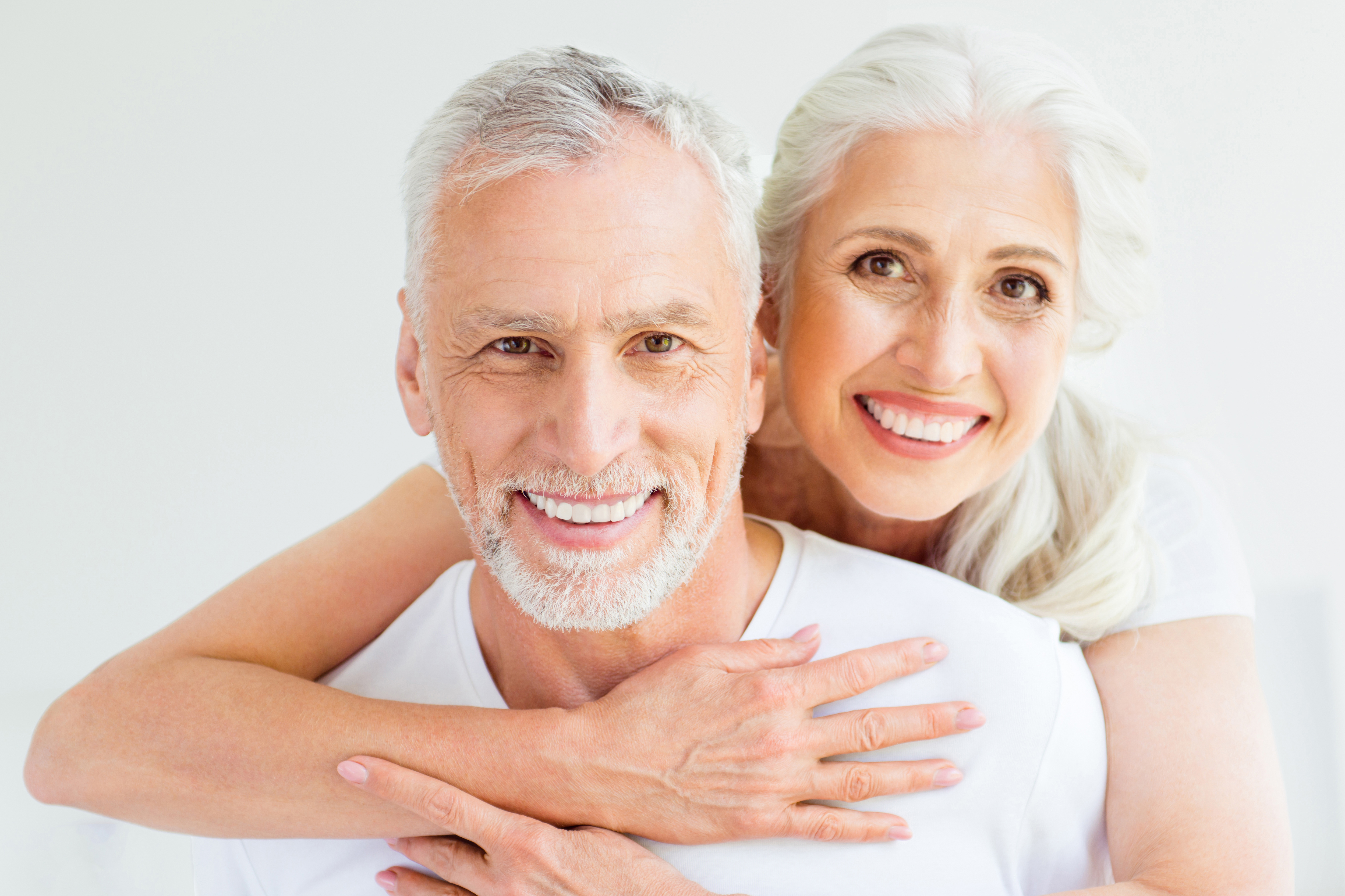 Happy middle aged couple in the park